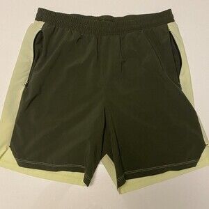 All in Motion, Size M, Green & Yellow color, shorts with no liner, zipper pocket
